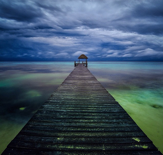 "Photo @ladzinski - A welcoming view of an isolated dock on the shores of the beautiful #MayanRiveira in the early morning hours."
