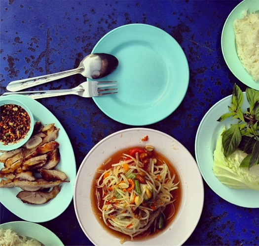 "Feasting on Isaan food, sticky rice and papaya salad, and grilled pork near my old neighbourhood." Image courtesy @legalnomads